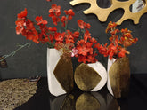 Three-piece white ceramic vase set with hammered gold geometric panel accents