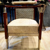 Curved-back solid wood rattan dining chair, front view