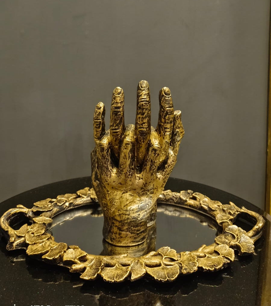 Golden Hand Gesture Sculpture detail view