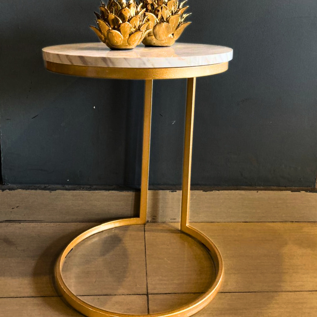 Round marble-top side table detail view