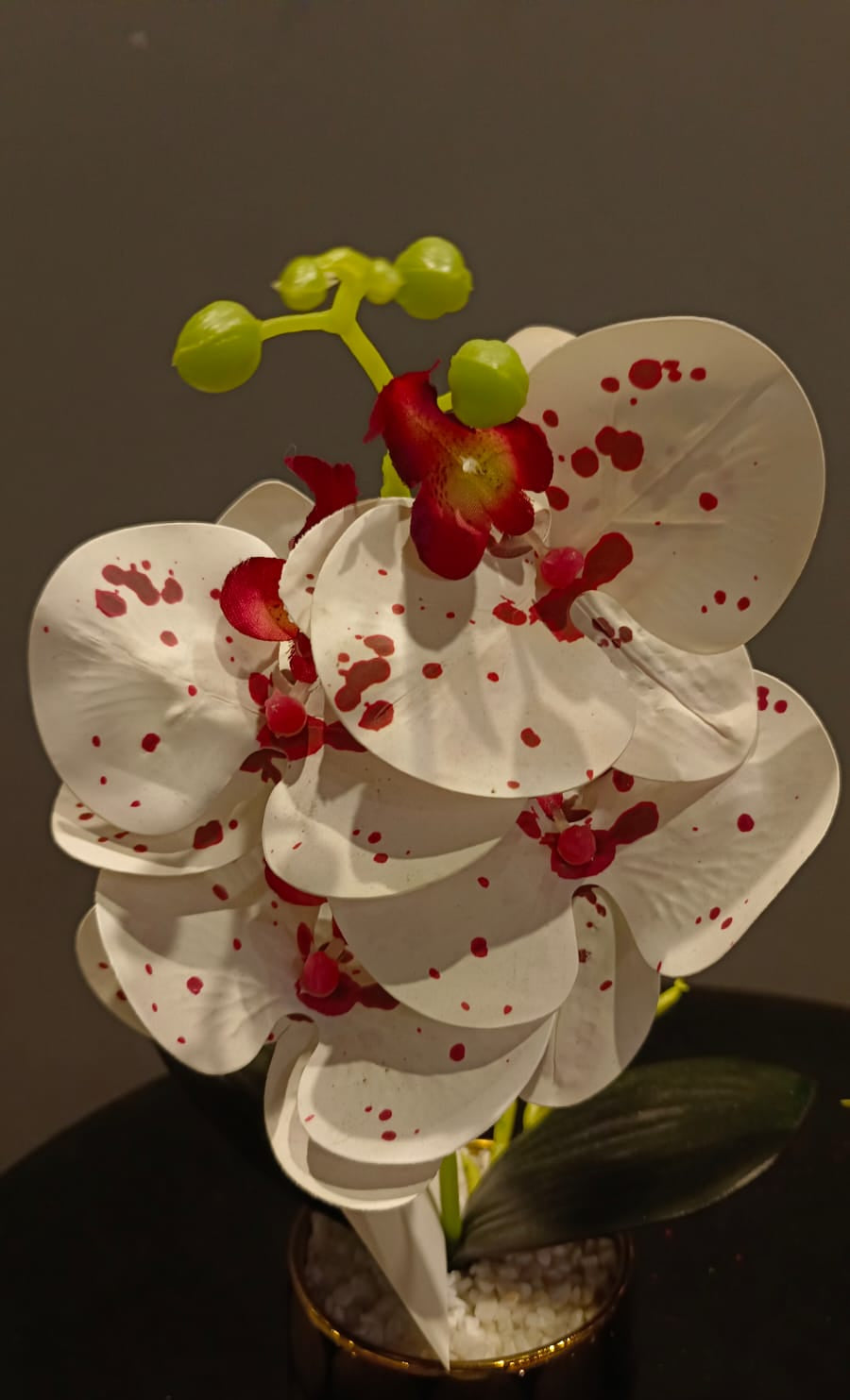 Luxury Orchid Centerpiece Duo styled on a console table