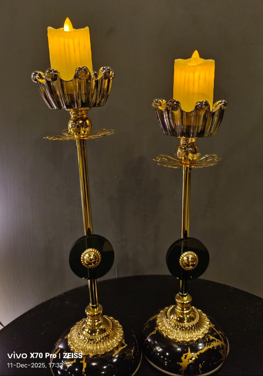 Black and gold candle stand set detail view