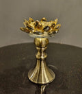 Bronze-finish decorative candle stand by Z Galleria