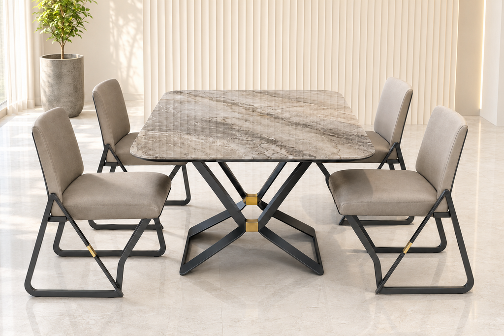 The Kinetic four-seater marble dining set with a grey veined top, interlocking graphite metal base, gold accents and four greige upholstered chairs. Four-seater marble dining table set in Pakistan featuring a grey veined marble top, modern graphite metal frame, gold accents and four comfortable greige upholstered chairs by Z Galleria Lahore.