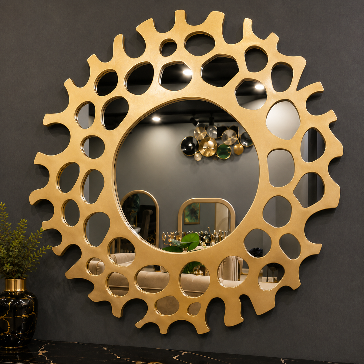 Helios gold round mirror styled on a wall by Z Galleria