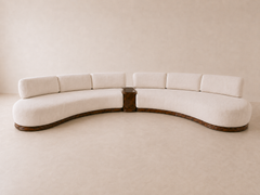 Ivory Arc curved sofa set styled in a living room by Z Galleria