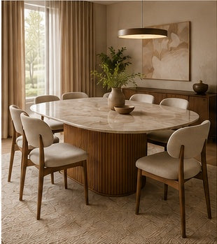 Elara oval dining set opposite three-quarter view, featuring six warm beige chairs, a Sheesham ribbed pedestal and light sintered stone top.