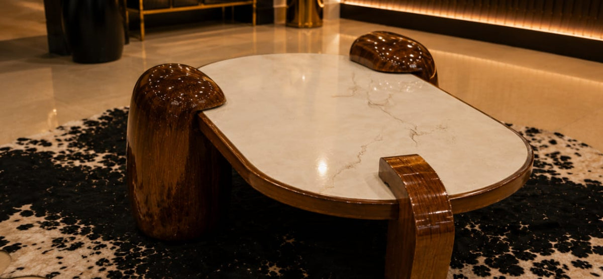 Arc Claw coffee table styled in a living room setting