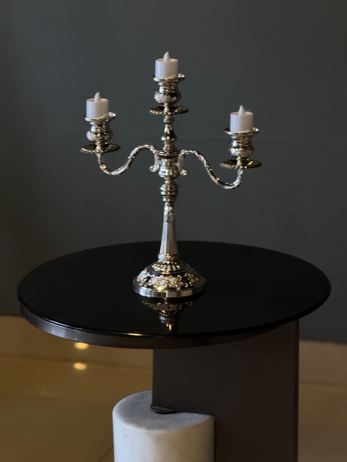 Royal candle stand styled on a table