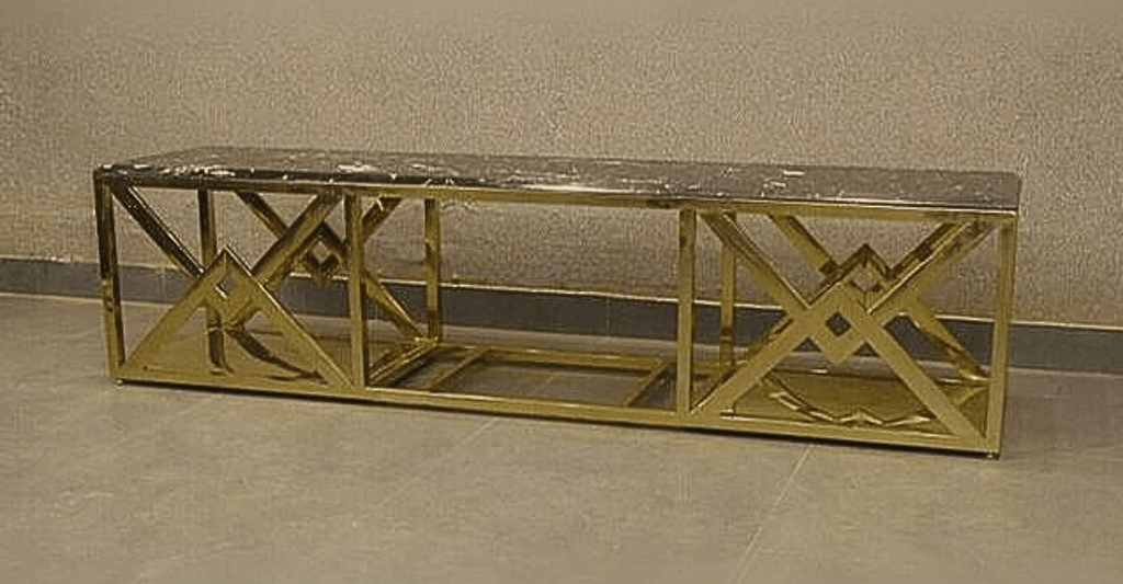 Gold marble-top media table detail view