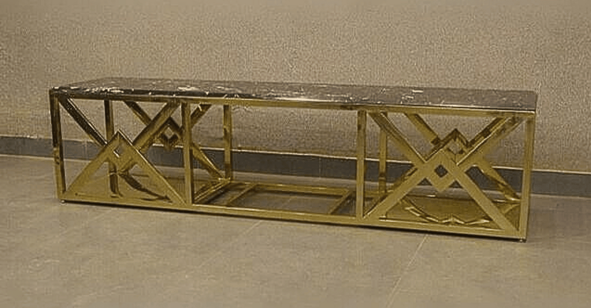 Gold marble-top media table detail view
