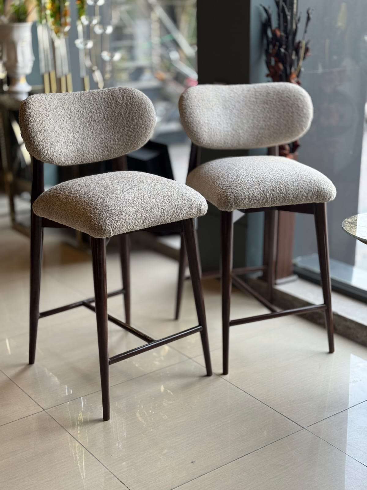 Minimalist boucle barstool pair detail view