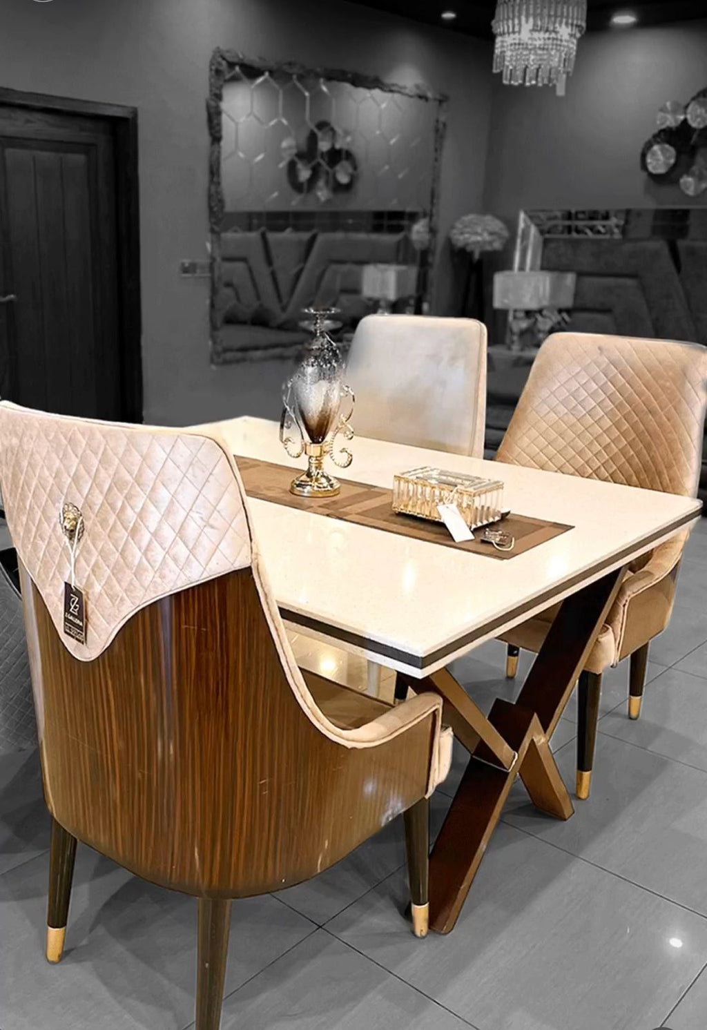 Small dining table and chairs set styled in a dining room by Z Galleria