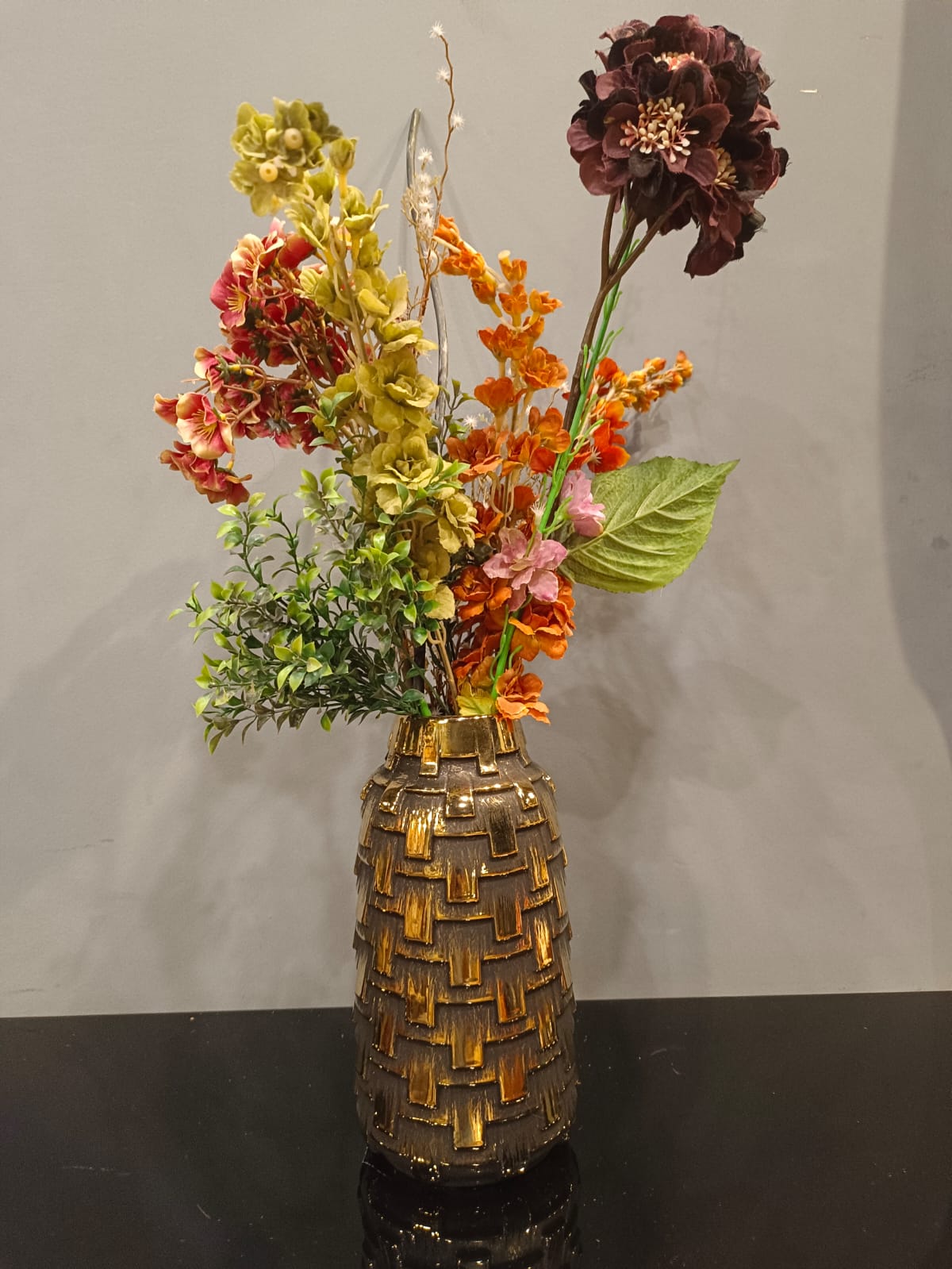 Embossed ceramic flower vase detail view
