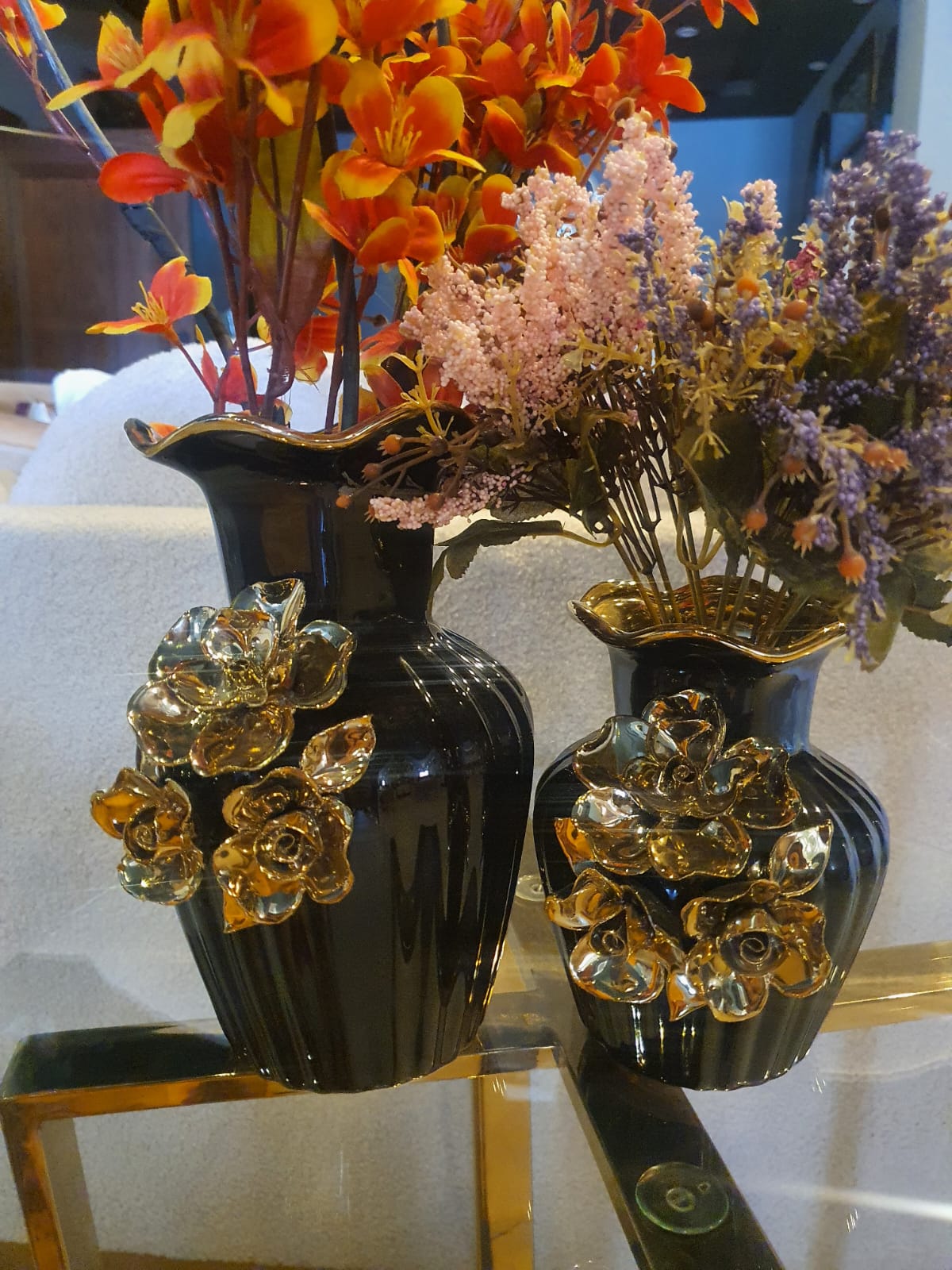 Black and gold ceramic vase set side profile