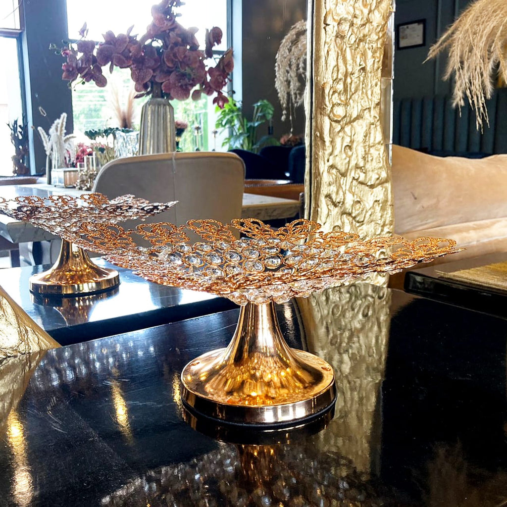 Golden crystal fruit serving platter styled on a table