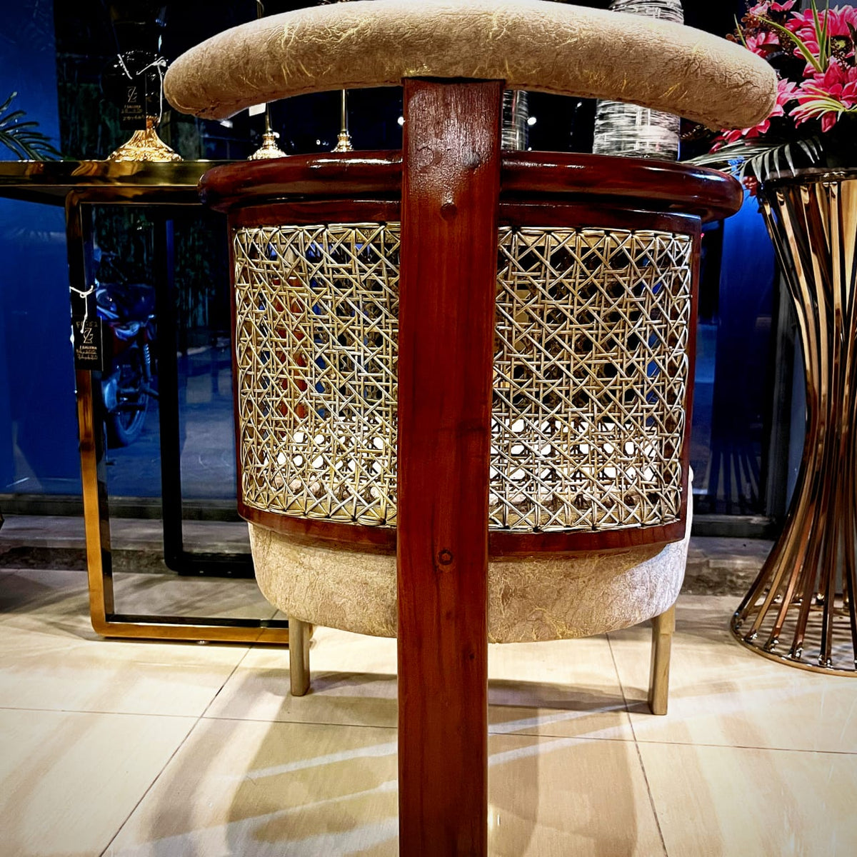 Curved-back solid wood rattan dining chair, side view