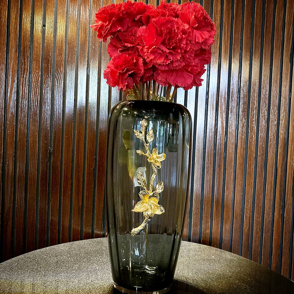 Large crystal vase styled on a shelf