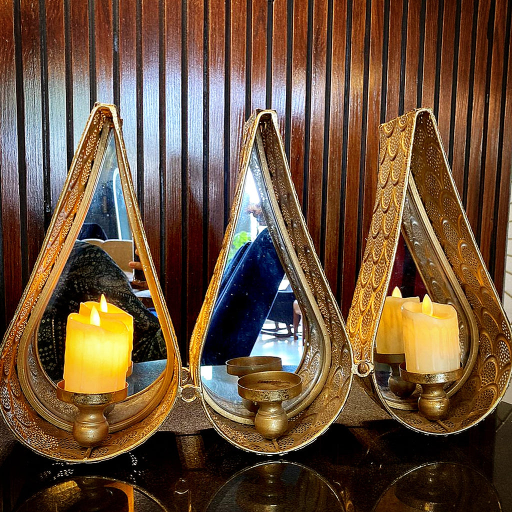 Wall-hanging dew drop candle holder side profile