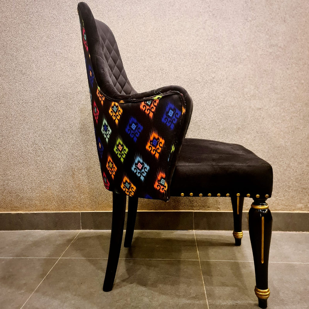 Modern black and gold dining chair detail view