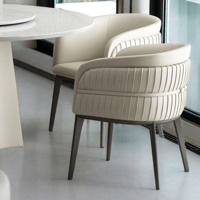 White upholstered dining chair with wooden frame