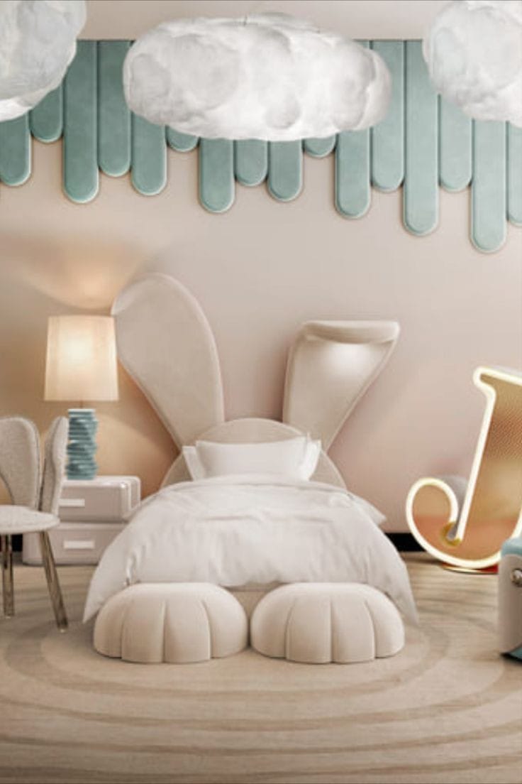 Rabbit-ear kids' bed with plush upholstered headboard and ottoman cushions