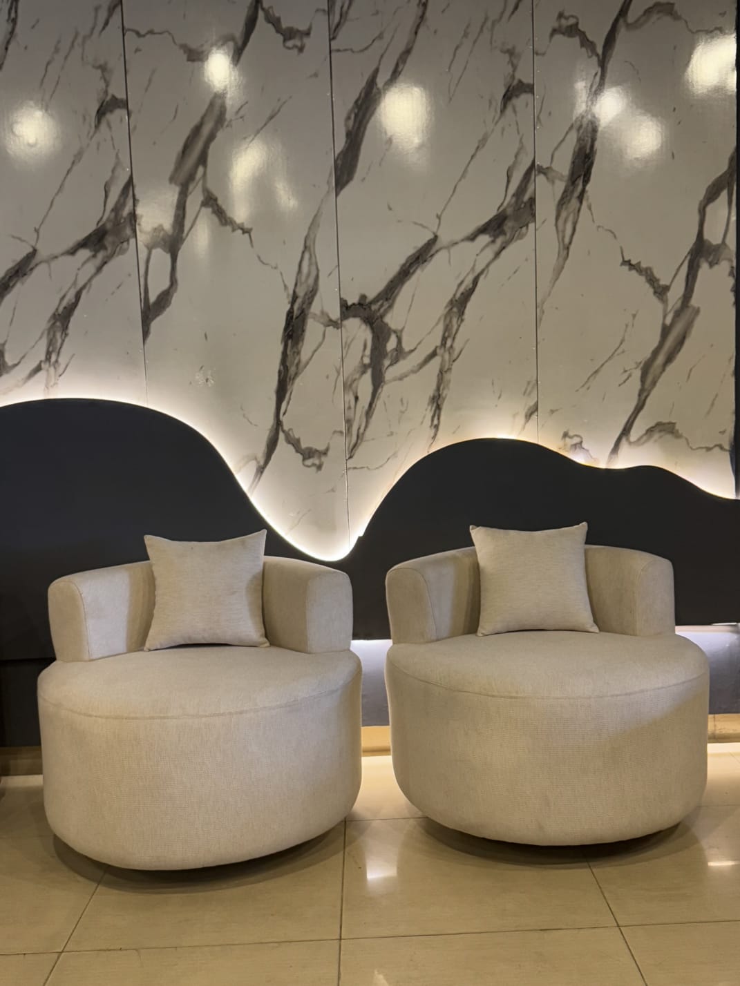 Elegant Rounded Revolving Chair styled in a living room