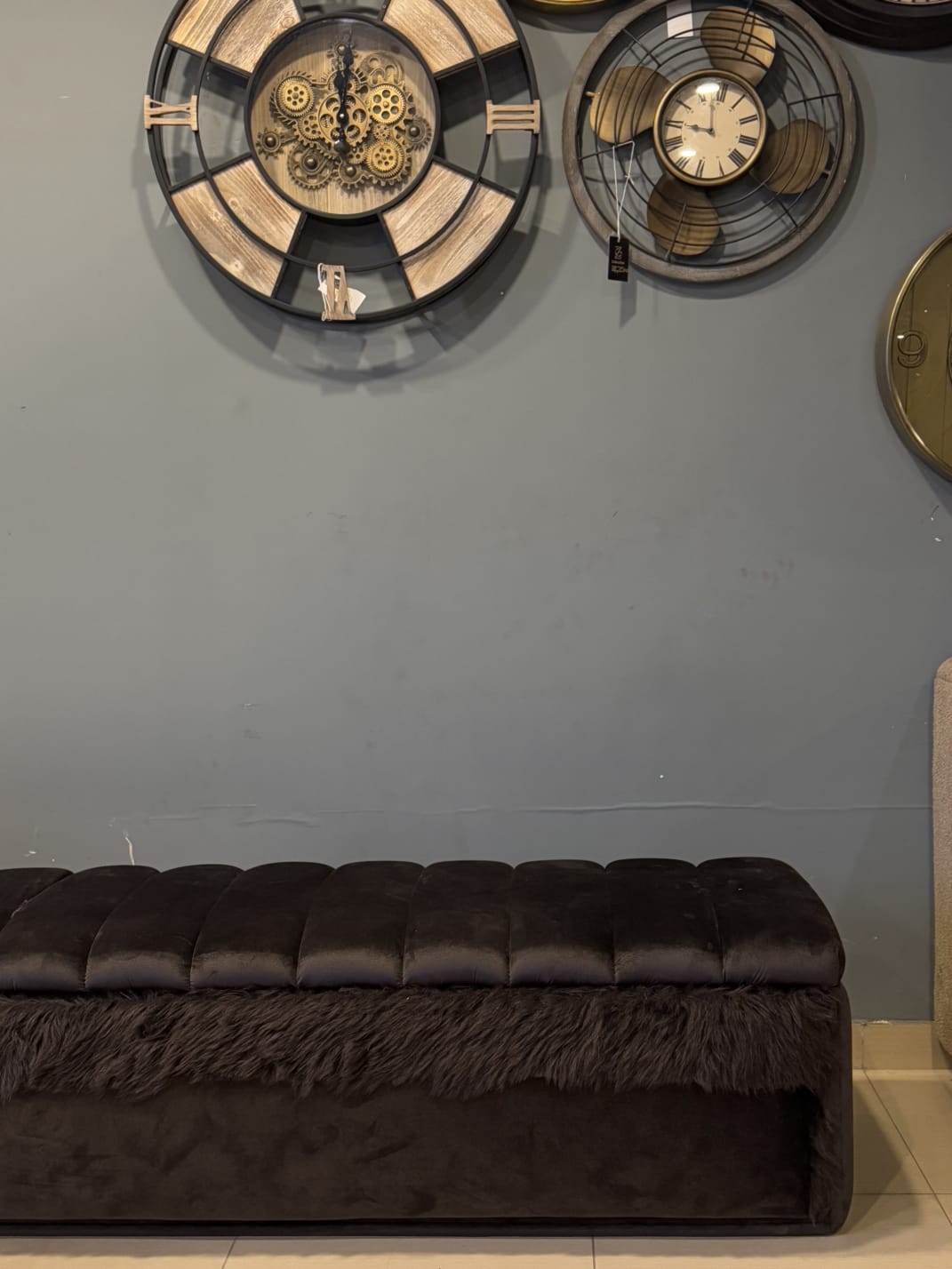 Black Storage Ottoman styled in a living room