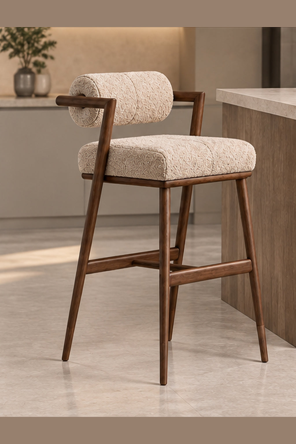 Arden Roll-Back Bar Stool in ivory boucle with solid wood structure, three-quarter view