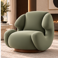 Three-quarter view of Aurelia Cocoon Lounge Chair in smooth sage boucle upholstery
