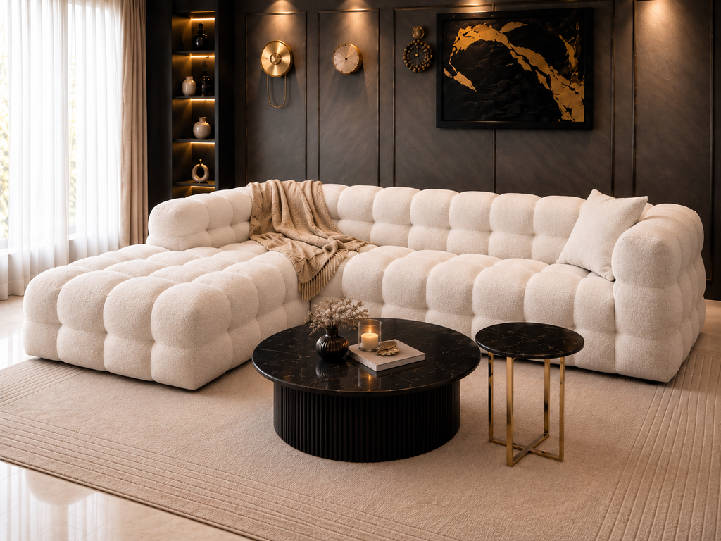 Three-quarter view of Aurelle Cloud seven-seater sectional sofa in ivory bouclé