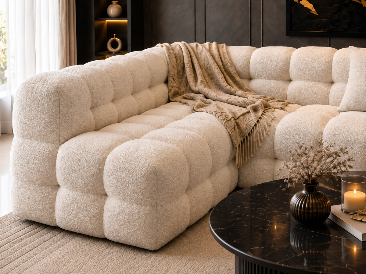 Detailed view of Aurelle Cloud seven-seater sectional sofa in premium ivory bouclé
