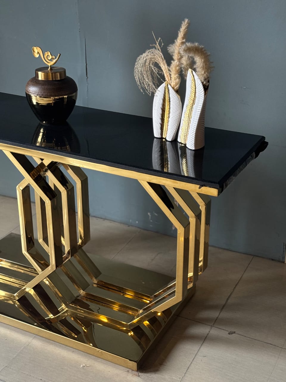 Premium black and gold console table by Z Galleria