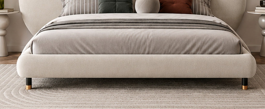 Luna Sculpted Bed ivory upholstered footboard and elevated leg detail by Z Galleria