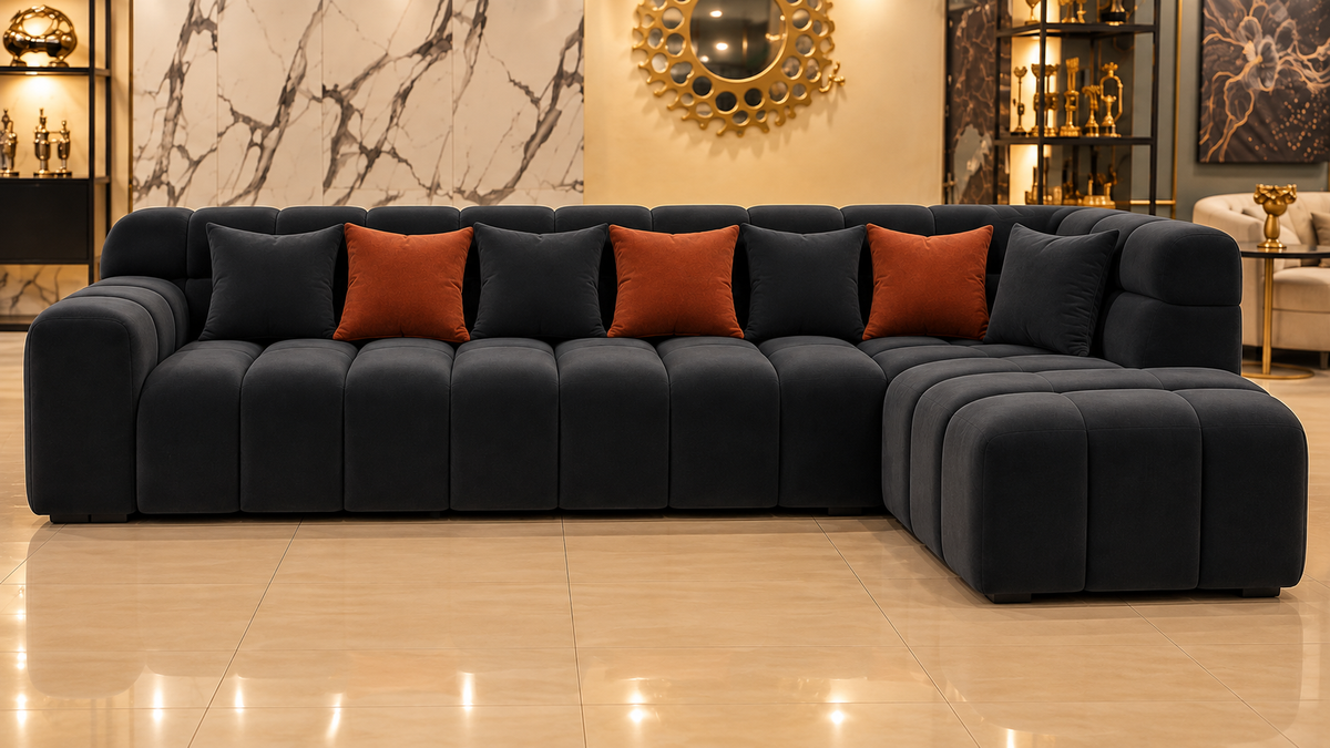 Noir Grid 5-seater L-shape sofa in charcoal velvet, front view in a luxury Lahore interior