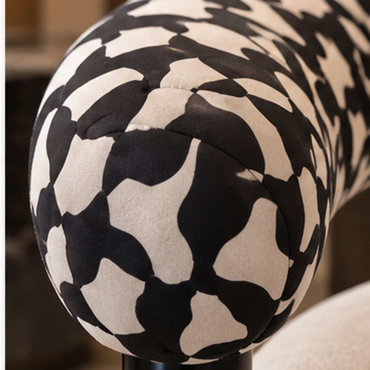 Noir Loop Sculptural Lounge Chair black-and-cream upholstery detail