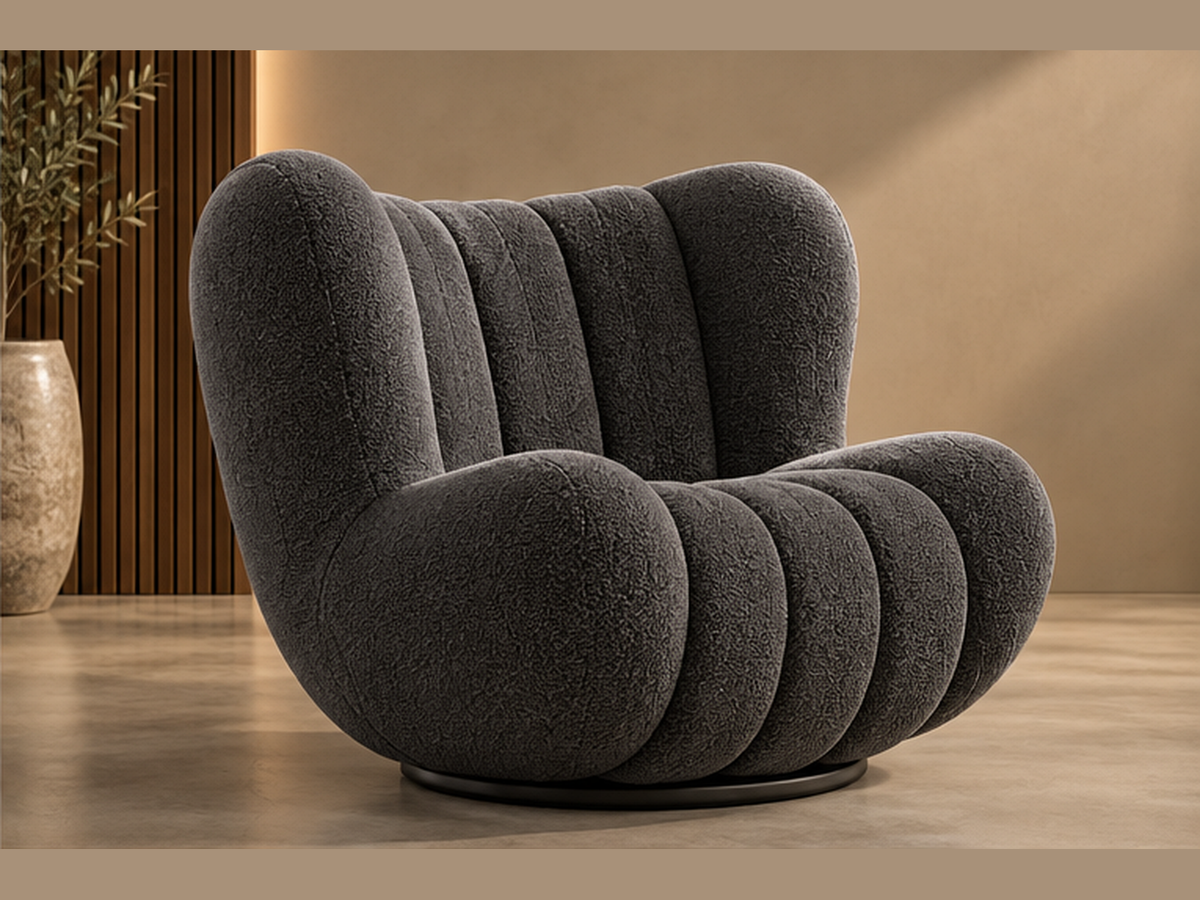 Noir Pleat Lounge Chair three-quarter view in charcoal boucle