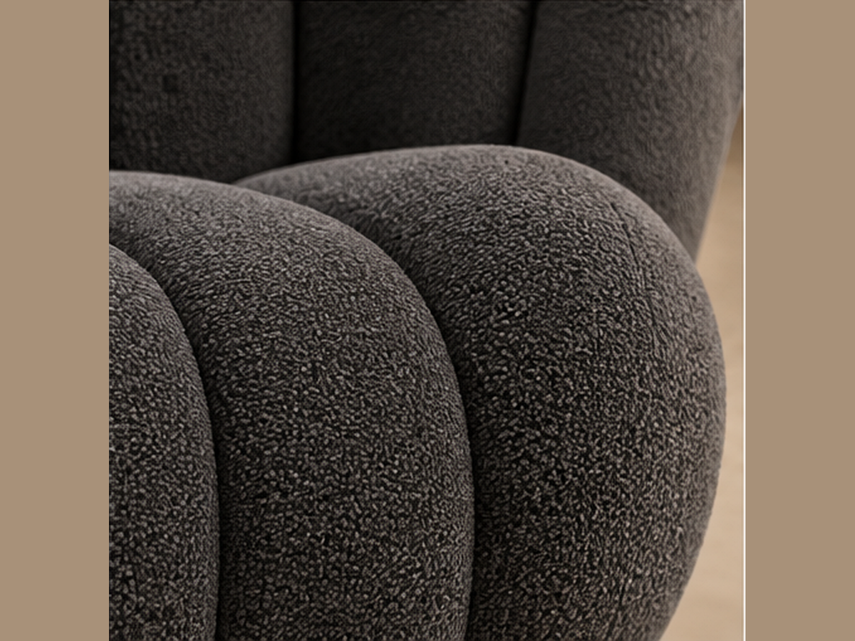 Close-up of sculpted channel detailing on Noir Pleat Lounge Chair