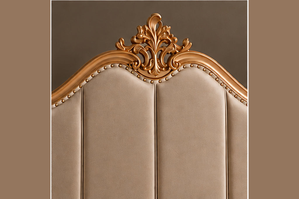 Regalia Crest Bed close-up showing ornate crest, gold carving and upholstered headboard detail