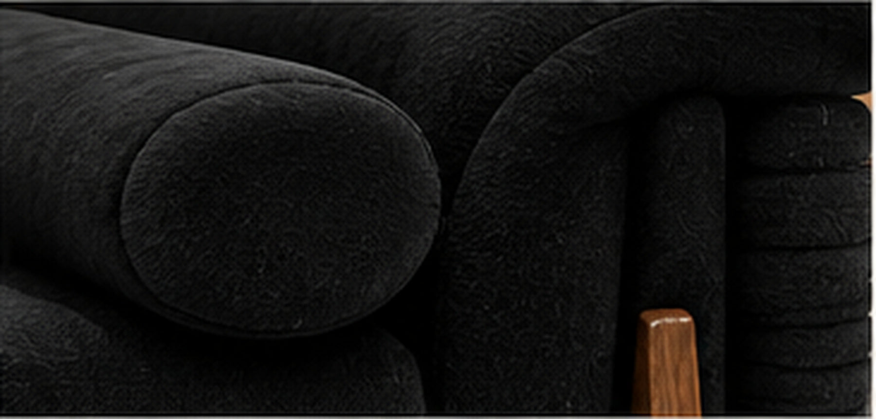 Rivan Velvet Lounge Sofa black velvet bolster cushion and solid wood detail by Z Galleria