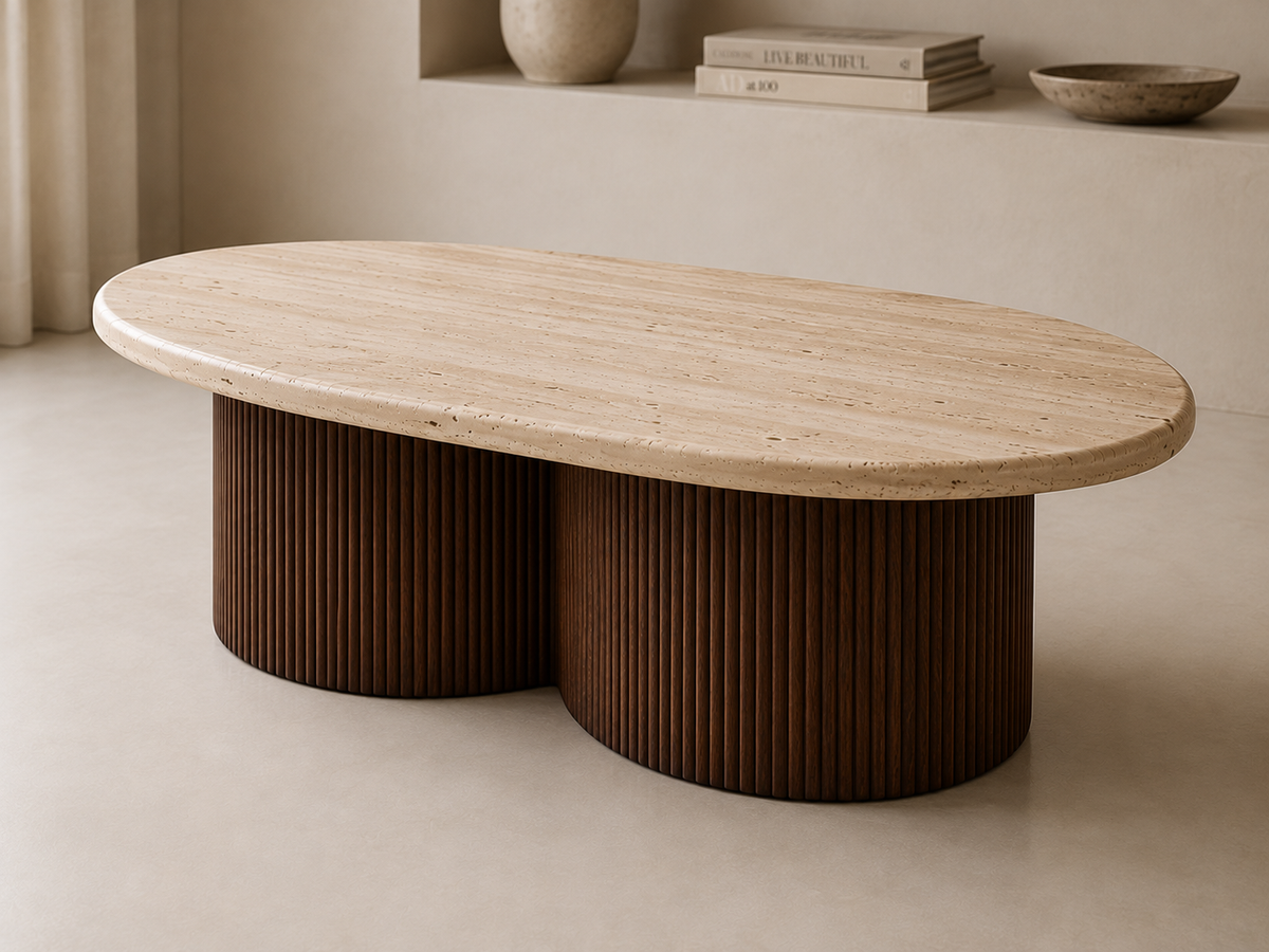Three-quarter view of Travertine Oval Coffee Table highlighting natural stone and ribbed Sheesham base